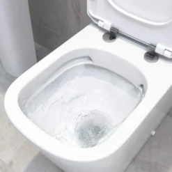 Ankam Rimless Closed Coupled Comfort Height Toilet & Soft Close Seat 10 Ankam Rimless Closed Coupled Comfort Height Toilet & Soft Close Seat -Roman Sales rimless toilet lifestyle1
